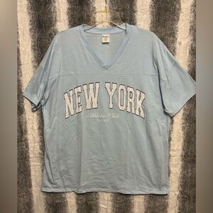 Light Blue 'New York' V-Neck T-Shirt. Size XL (16-18)